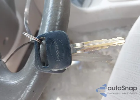 2002 Toyota Corolla Ce из США, поврежденный, VIN 2T1BR12E02C518874